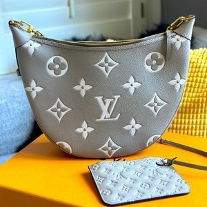 LOUIS VUITTON
Loop hobo bicolor moogram leather
